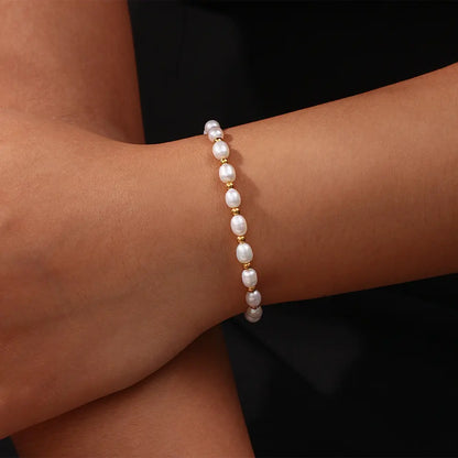 Elegant Pärl och Guld Armband
